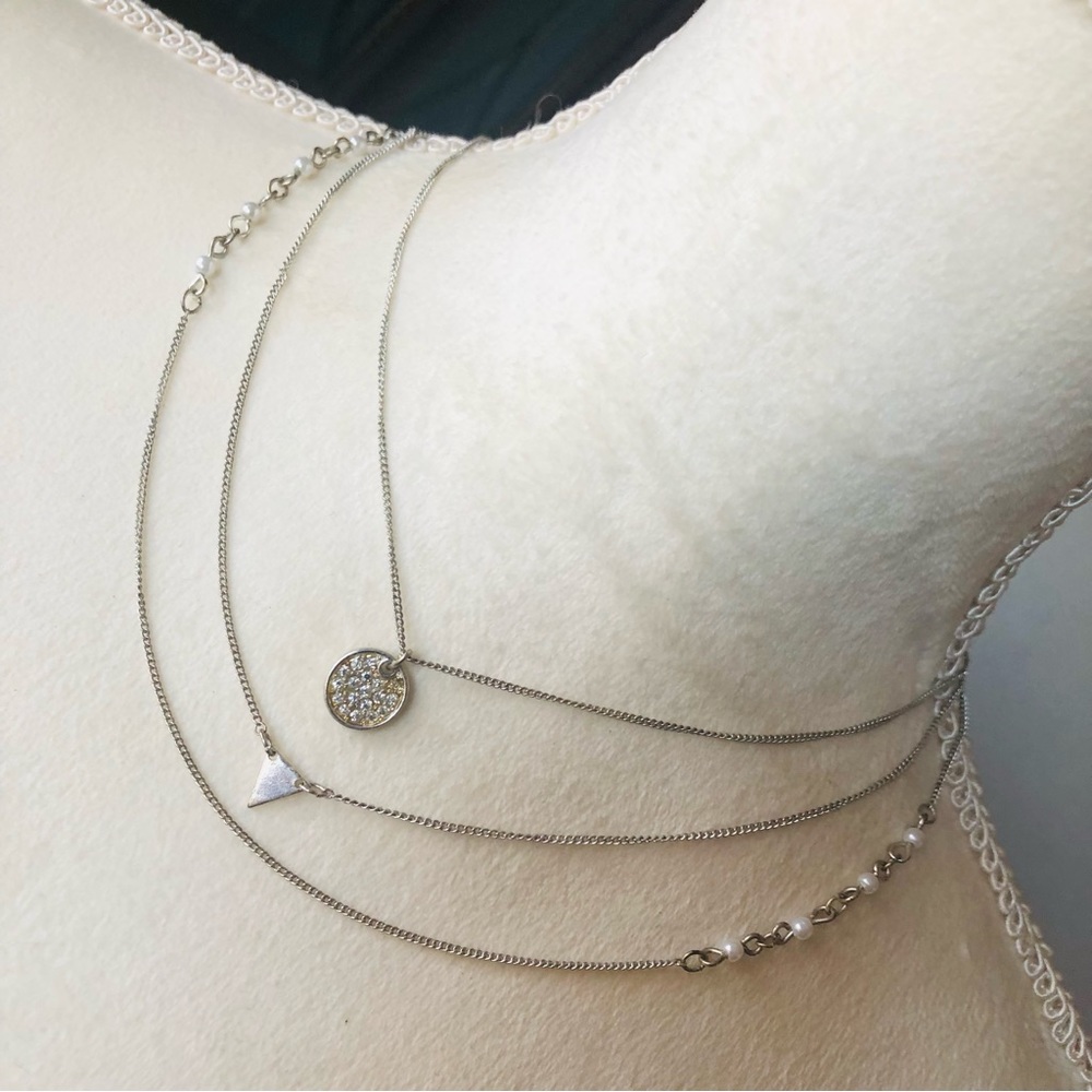 Silver plated triple strand pearl and charm chain necklace